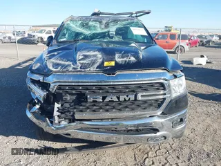 2022 Ram 1500 Big Horn z VIN 1C6RREBG7NN451903, wystawiony jako IAAI lot #40764817 z przebiegiem 31 109 mil mil oraz . Historia ofert i sprzedaży dostępna na DreamBid. Obrazek 6.