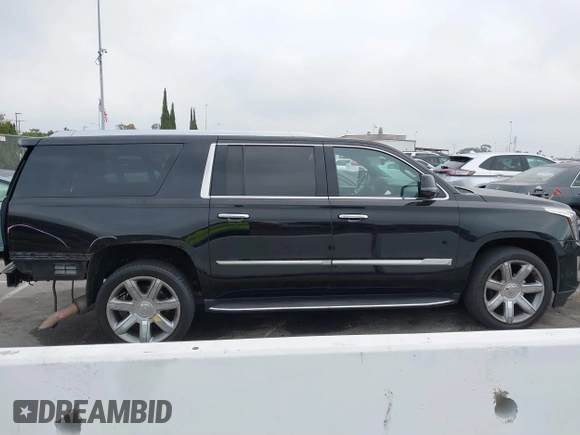 2020 Cadillac Escalade ESV Luxury z VIN 1GYS4HKJ7LR116999, wystawiony jako IAAI lot #40707280 z przebiegiem 117 358 mil mil oraz . Historia ofert i sprzedaży dostępna na DreamBid. Obrazek 14.