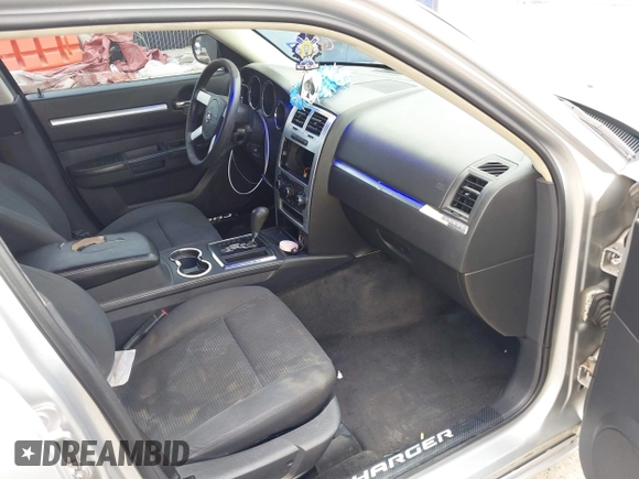 2010 Dodge Charger SXT with VIN 2B3CA3CV0AH237203, listed as a IAAI auction lot 42058517 with 257,514 mi miles and . Bid and sale history available at DreamBid. Image 5.