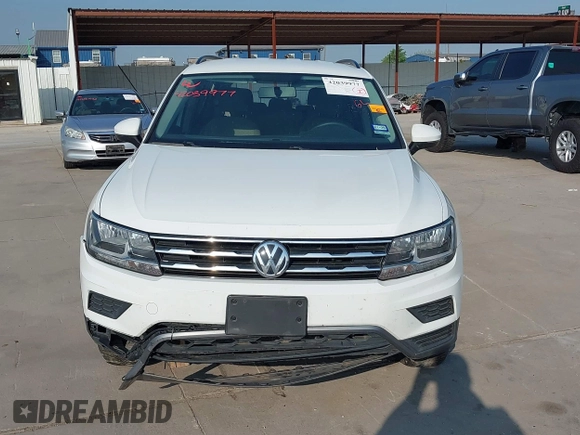 2018 Volkswagen Tiguan S with VIN 3VV1B7AX1JM119971, listed as a IAAI auction lot 42039977 with 108,932 mi miles and . Bid and sale history available at DreamBid. Image 12.