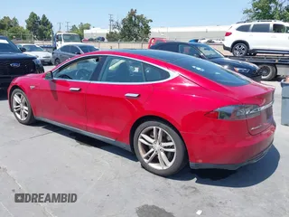 2014 Tesla Model S 60 with VIN 5YJSA1S11EFP33278, listed as a IAAI auction lot 42441781 with Not provided miles and . Bid and sale history available at DreamBid. Image 3.