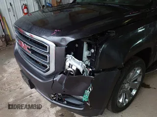 2015 GMC Yukon XL SLT with VIN 1GKS2HKC6FR667110, listed as a IAAI auction lot 41472250 with 141,383 mi miles. Bid and sale history available at carsss.com. Image 6.