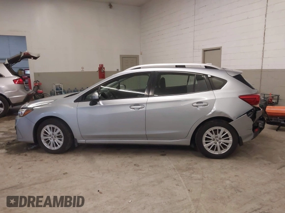 2017 Subaru Impreza Premium z VIN 4S3GTAB63H3705818, wystawiony jako IAAI lot #41568064 z przebiegiem 132 046 mil mil oraz . Historia ofert i sprzedaży dostępna na DreamBid. Obrazek 14.