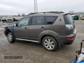 2010 Mitsubishi Outlander SE with VIN JA4AS3AW5AZ001574, listed as a Copart auction lot 47678375 with 211,989 mi miles and Salvage title. Bid and sale history available at DreamBid. Image 2.