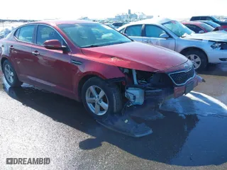 2015 Kia Optima LX with VIN 5XXGM4A79FG517679, listed as a IAAI auction lot 41748023 with 125,666 mi miles. Bid and sale history available at carsss.com. Image 1.