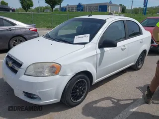 2011 Chevrolet Aveo 1LT with VIN KL1TD5DE7BB139819, listed as a IAAI auction lot 42090773 with 124,559 mi miles and . Bid and sale history available at DreamBid. Image 2.