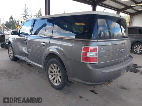 2009 Ford Flex SEL with VIN 2FMEK62C09BA50317, listed as a IAAI auction lot 41819275 with 171,813 mi miles. Bid and sale history available at carsss.com. Image 3.