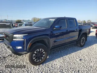 2023 Nissan Frontier Pro-4X z VIN 1N6ED1EK6PN671662, wystawiony jako Copart lot #48215525 z przebiegiem 13 814 mil mil oraz Szkoda całkowita • Salvage title. Historia ofert i sprzedaży dostępna na DreamBid. Obrazek 1.