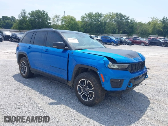 2022 Jeep Grand Cherokee Trailhawk with VIN 1C4RJYC68N8759961, listed as a IAAI auction lot 42589997 with 28,429 mi miles and . Bid and sale history available at DreamBid. Image 1.