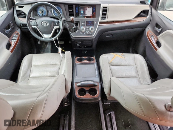 2015 Toyota Sienna XLE with VIN 5TDYK3DC4FS617099, listed as a Copart auction lot 61128025 with 114,508 mi miles and Salvage title. Bid and sale history available at DreamBid. Image 8.