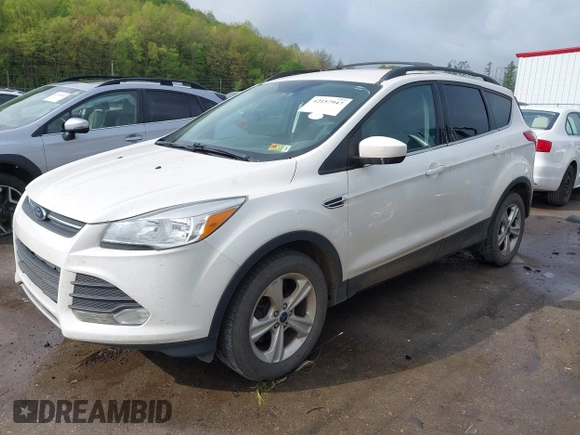 2015 Ford Escape SE with VIN 1FMCU9G91FUB27234, listed as a IAAI auction lot 42157947 with 210,034 mi miles. Bid and sale history available at carsss.com. Image 2.