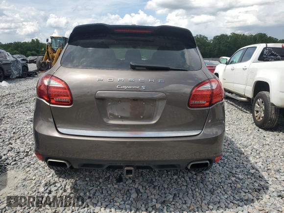 2014 Porsche Cayenne S Hybrid with VIN WP1AE2A29ELA51406, listed as a Copart auction lot 61163965 with 99,047 mi miles and Clean title. Bid and sale history available at DreamBid. Image 6.