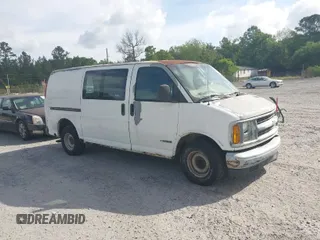 1998 Chevrolet Chevy Van z VIN 1GCFG15WXW1013981, wystawiony jako IAAI lot #42067738 z przebiegiem 265 287 mil mil oraz . Historia ofert i sprzedaży dostępna na DreamBid. Obrazek 1.