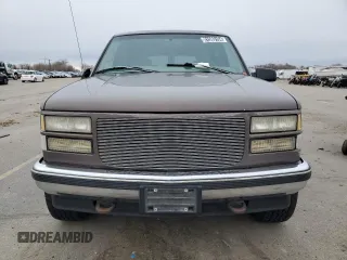 1997 GMC Suburban with VIN 3GKGK26J0VG513194, listed as a Copart auction lot 45054235 with 228,363 mi miles and Salvage Title. Bid and sale history available at carsss.com. Image 5.
