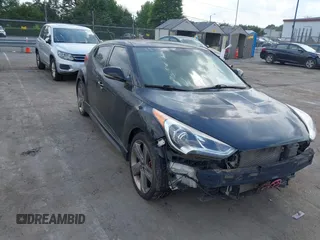 2013 Hyundai Veloster Turbo z VIN KMHTC6AE5DU110652, wystawiony jako IAAI lot #42486326 z przebiegiem Nie podano mil oraz . Historia ofert i sprzedaży dostępna na DreamBid. Obrazek 1.