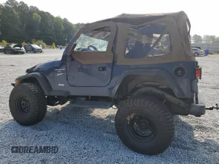 2001 Jeep Wrangler Sport with VIN 1J4FA49S41P335459, listed as a Copart auction lot 72831244 with 161,464 mi miles and Salvage Title. Bid and sale history available at carsss.com. Image 2.