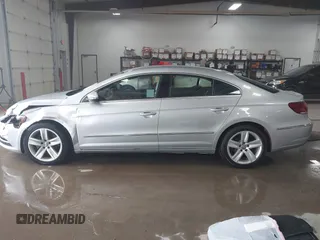 2015 Volkswagen CC R-Line z VIN WVWBP7AN9FE826400, wystawiony jako IAAI lot #40931896 z przebiegiem 117 022 mil mil oraz . Historia ofert i sprzedaży dostępna na DreamBid. Obrazek 14.