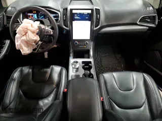 2021 Ford Edge Titanium with VIN 2FMPK4K98MBA18841, listed as a Copart auction lot 56207745 with 69,249 mi miles and Salvage title. Bid and sale history available at DreamBid. Image 8.