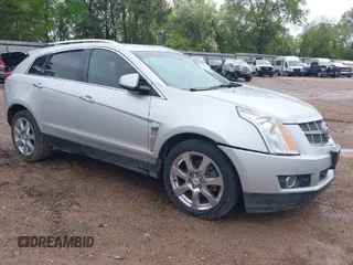 2011 Cadillac SRX Performance Collection with VIN 3GYFNBEY5BS657999, listed as a IAAI auction lot 41891715 with 198,296 mi miles. Bid and sale history available at carsss.com. Image 1.