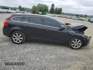 2016 Volvo V60 T5 Drive-E Premier with VIN YV140MEK2G1287763, listed as a Copart auction lot 64297004 with 145,377 mi miles and Salvage Title. Bid and sale history available at carsss.com. Image 4.