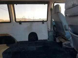 1986 GMC Safari z VIN 1GDDM15Z1GB521872, wystawiony jako Copart lot #87655995 z przebiegiem 30 889 mil mil oraz Szkody całkowita. Historia ofert i sprzedaży dostępna na DreamBid. Obrazek 11.