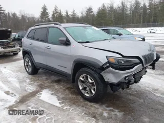 2019 Jeep Cherokee Trailhawk z VIN 1C4PJMBX2KD298169, wystawiony jako IAAI lot #41412123 z przebiegiem 63 214 mil mil oraz . Historia ofert i sprzedaży dostępna na DreamBid. Obrazek 1.