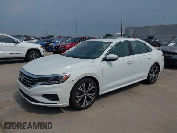 2021 Volkswagen Passat SE z VIN 1VWSA7A32MC014376, wystawiony jako IAAI lot #42314372 z przebiegiem 81 209 mil mil oraz . Historia ofert i sprzedaży dostępna na DreamBid. Obrazek 19.
