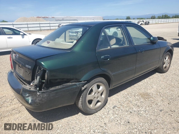 2002 Mazda Protege DX with VIN JM1BJ225121567924, listed as a Copart auction lot 54847545 with 93,653 mi miles and Salvage Title. Bid and sale history available at DreamBid. Image 3.