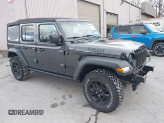 2021 Jeep Wrangler Unlimited Sport S with VIN 1C4HJXDN9MW822281, listed as a IAAI auction lot 41163183 with 23,665 mi miles. Bid and sale history available at carsss.com. Image 1.