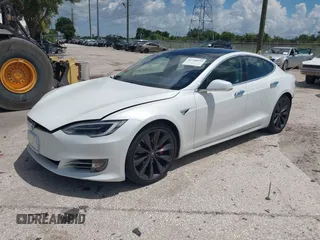2017 Tesla Model S 100D with VIN 5YJSA1E45HF189006, listed as a IAAI auction lot 42540693 with 64,827 mi miles and . Bid and sale history available at DreamBid. Image 2.