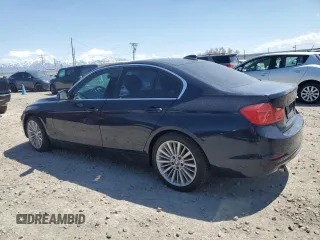 2015 BMW 3 Series 328d with VIN WBA3D3C56FK158184, listed as a Copart auction lot 53867345 with 130,952 mi miles and Clean title. Bid and sale history available at DreamBid. Image 2.