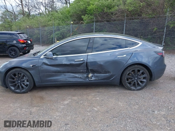 2020 Tesla Model 3 Long Range with VIN 5YJ3E1EB2LF646449, listed as a IAAI auction lot 42059086 with 120,981 mi miles and . Bid and sale history available at DreamBid. Image 15.