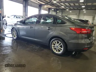2017 Ford Focus SE with VIN 1FADP3F21HL205754, listed as a Copart auction lot 67166984 with 83,617 mi miles and Salvage title. Bid and sale history available at DreamBid. Image 2.