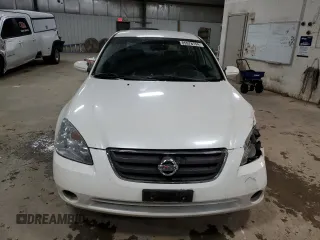 2002 Nissan Altima SL with VIN 1N4AL11D92C285520, listed as a Copart auction lot 85978794 with 128,788 mi miles and Salvage Title. Bid and sale history available at carsss.com. Image 5.