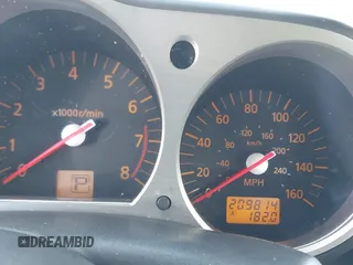 2004 Nissan 350Z Touring with VIN JN1AZ34E84T060682, listed as a IAAI auction lot 41616199 with 209,814 mi miles. Bid and sale history available at carsss.com. Image 7.