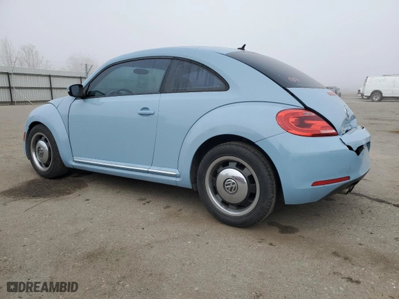 2012 Volkswagen Beetle 2.5L PZEV with VIN 3VWJP7AT1CM652433, listed as a Copart auction lot 85989164 with 115,406 mi miles and Salvage Title. Bid and sale history available at carsss.com. Image 2.