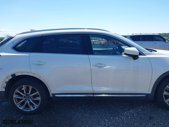 2016 Mazda CX-9 Grand Touring with VIN JM3TCBDY7G0125708, listed as a IAAI auction lot 39891843 with 133,988 mi miles. Bid and sale history available at carsss.com. Image 13.
