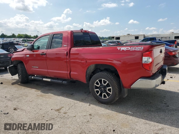 2021 Toyota Tundra SR with VIN 5TFUY5F11MX971951, listed as a Copart auction lot 64889875 with 69,297 mi miles and Salvage title. Bid and sale history available at DreamBid. Image 2.