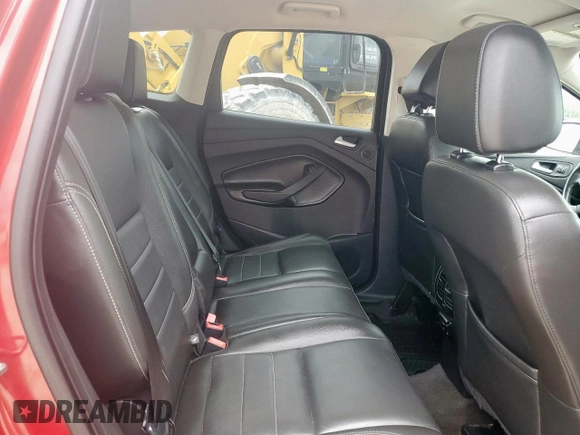 2015 Ford Escape Titanium z VIN 1FMCU9J94FUB09903, wystawiony jako Copart lot #59922275 z przebiegiem 132 243 mil mil oraz Czysty tytuł • Clean title. Historia ofert i sprzedaży dostępna na DreamBid. Obrazek 11.