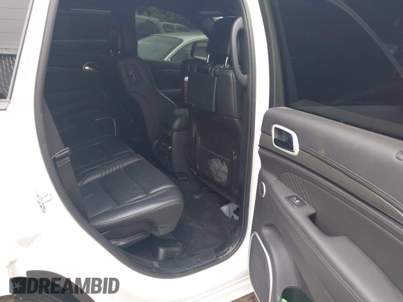 2021 Jeep Grand Cherokee Trackhawk with VIN 1C4RJFN95MC843131, listed as a IAAI auction lot 42688185 with 16,391 mi miles and . Bid and sale history available at DreamBid. Image 8.