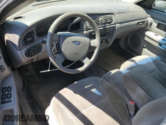 2005 Ford Taurus SE with VIN 1FAFP53U25A303516, listed as a Copart auction lot 63250505 with 203,463 mi miles and Salvage title. Bid and sale history available at DreamBid. Image 8.