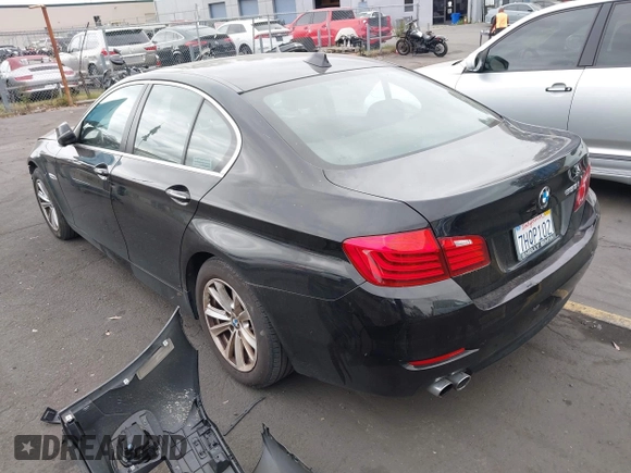 2015 BMW 5 Series 528i with VIN WBA5A5C56FD514814, listed as a IAAI auction lot 42052381 with 76,306 mi miles. Bid and sale history available at carsss.com. Image 3.
