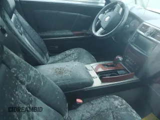 2008 Cadillac XLR z VIN 1G6YV36A285600199, wystawiony jako Copart lot #76229514 z przebiegiem Nie podano mil oraz Szkody całkowita. Historia ofert i sprzedaży dostępna na DreamBid. Obrazek 10.