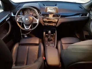 2017 BMW X1 sDrive28i with VIN WBXHU7C37H5H34418, listed as a Copart auction lot 47982795 with 67,980 mi miles and Salvage Title. Bid and sale history available at carsss.com. Image 8.