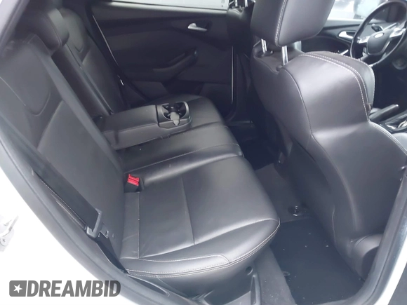 2014 Ford Focus ST with VIN 1FADP3L94EL256548, listed as a IAAI auction lot 40936756 with 79,340 mi miles and . Bid and sale history available at carsss.com. Image 8.