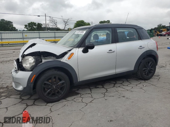 2012 MINI Countryman with VIN WMWZB3C5XCWM06778, listed as a Copart auction lot 61201285 with 64,676 mi miles and Salvage title. Bid and sale history available at DreamBid. Image 1.