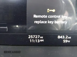 2022 Audi e-tron Premium with VIN WA1AAAGE6NB027461, listed as a IAAI auction lot 41830461 with 25,727 mi miles. Bid and sale history available at carsss.com. Image 7.