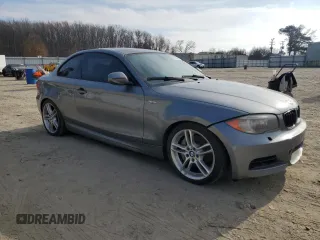 2012 BMW 1 Series 135i with VIN WBAUC9C56CVM12237, listed as a Copart auction lot 85595234 with Not provided miles and Salvage title. Bid and sale history available at DreamBid. Image 4.