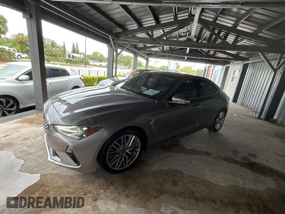 2021 Genesis G70 2.0T z VIN KMTG34LAXMU074866, wystawiony jako Copart lot #56966995 z przebiegiem 54 000 mil mil oraz Czysty tytuł • Clean title. Historia ofert i sprzedaży dostępna na DreamBid. Obrazek 2.