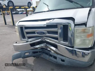 2009 Ford Econoline Cargo Commercial with VIN 1FTNE14W09DA38068, listed as a IAAI auction lot 41690071 with 182,337 mi miles and . Bid and sale history available at DreamBid. Image 6.